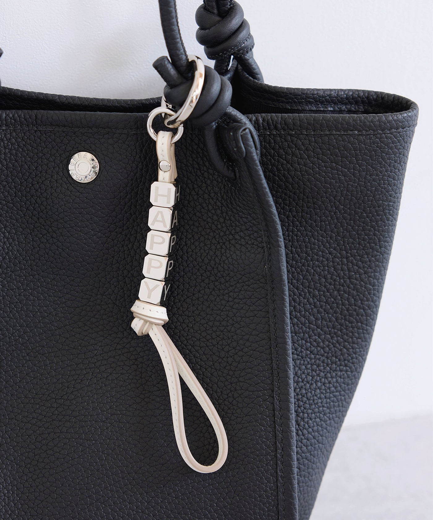 店舗・公式EC限定／HAPPY ロゴチャーム – TOPKAPI（トプカピ）